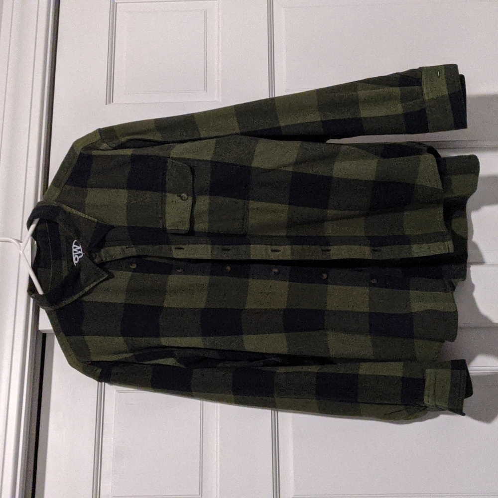 Rugged wearing men's flannel like button down shirt